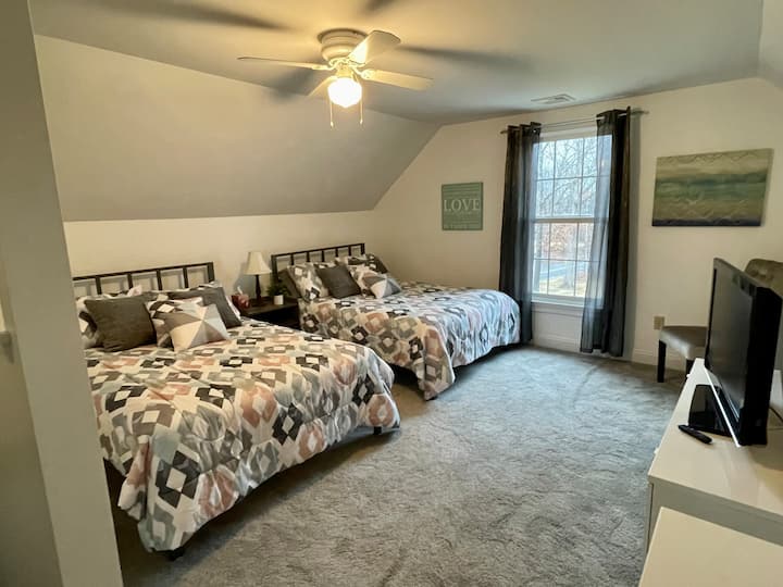 Chambre au 3e étage avec deux grands lits