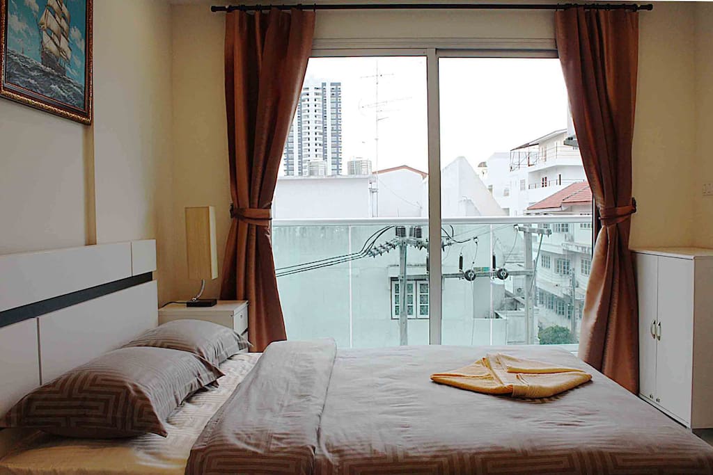 Exit to the balcony through a sliding glass door.