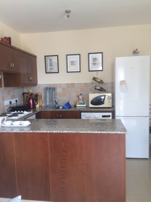 Fully equipped kitchen with modern appliances