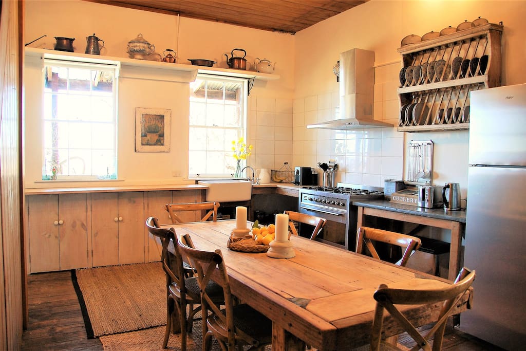 Well stocked country kitchen with entertainer's oven, combustion fireplace and valley views.