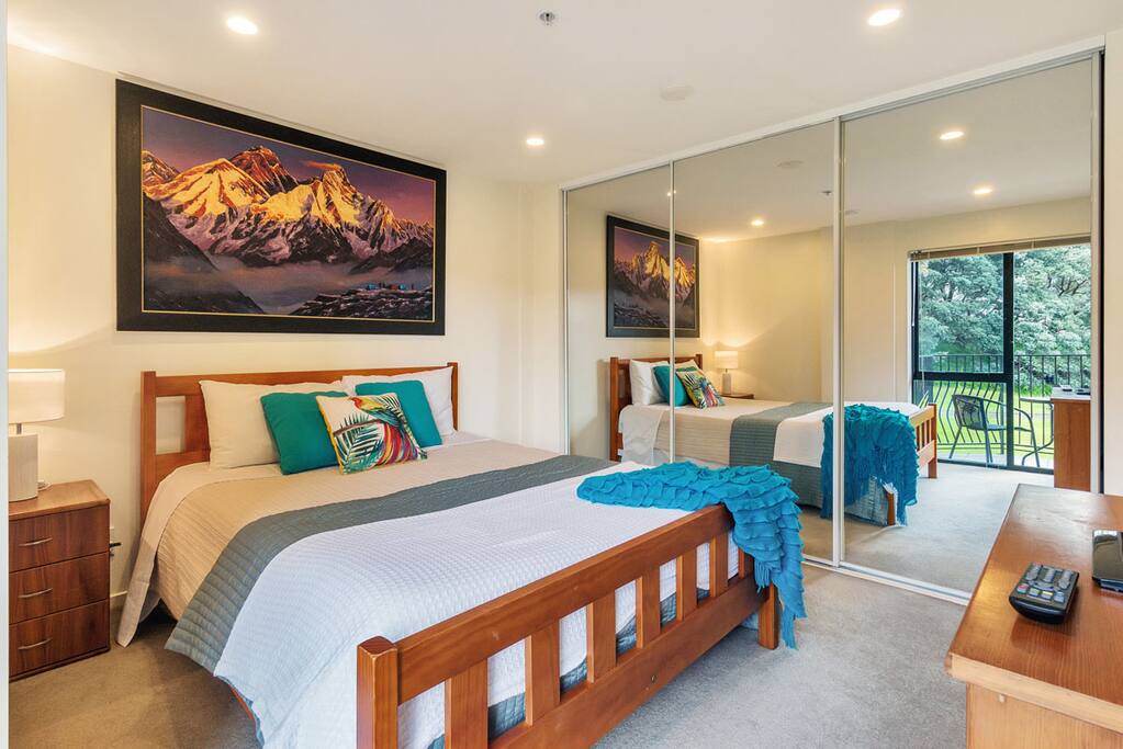 Comfy bed, triple door wardrobe.