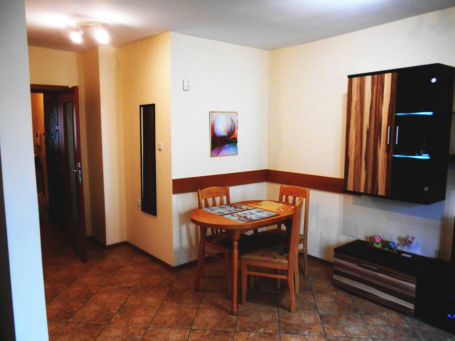 This is the dining part of our living room. There you can have dinner, relax or you can use it as a desk for your laptop.