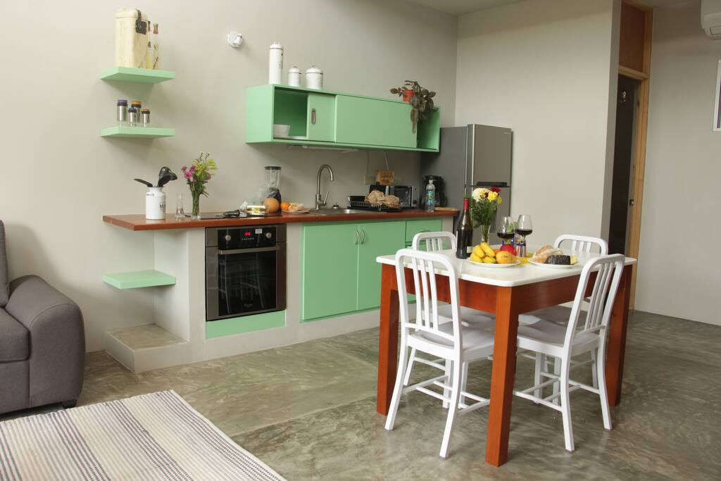 Full kitchen and dining area