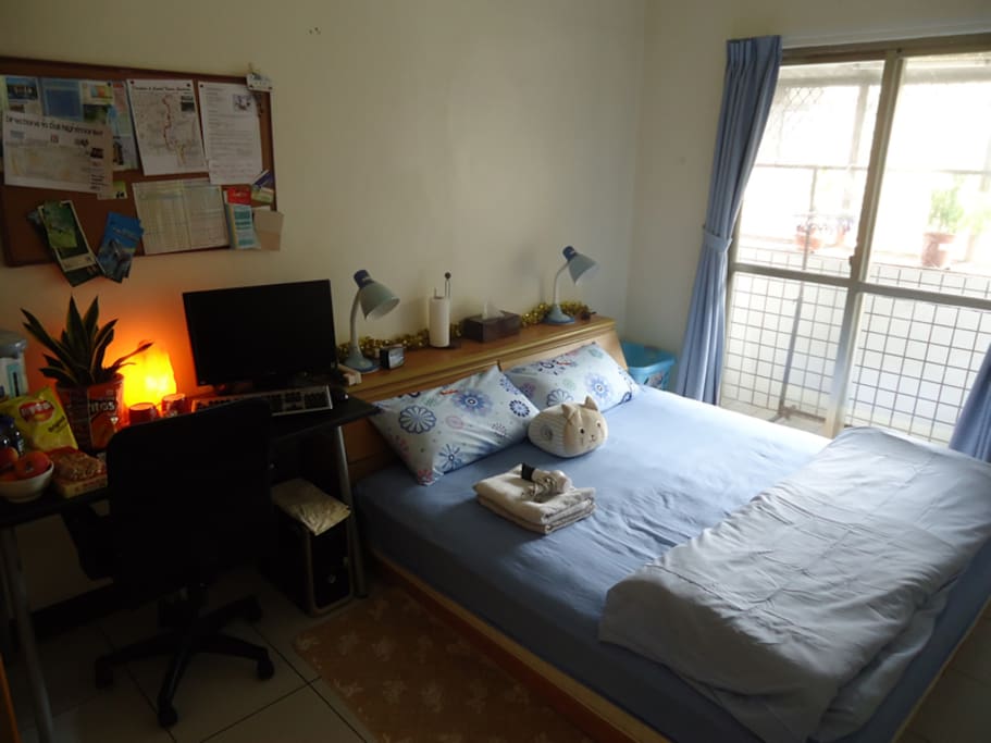Double Air-conditioned Guestroom includes bedside lamp, king-size bed linen & extra blankets.