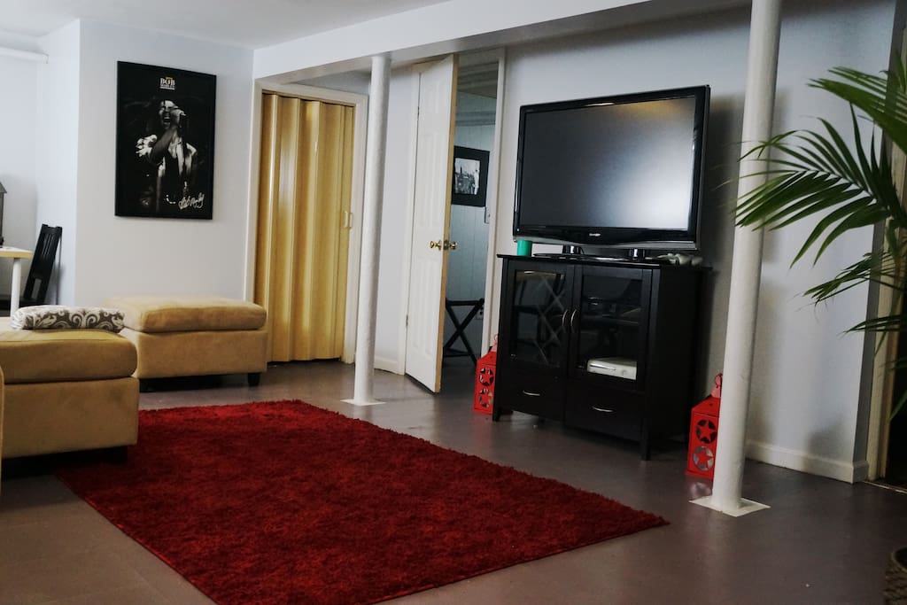 42" flat screen TV with premium cable, DVD & Xbox.