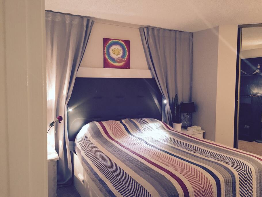 A bedroom. Queen size the most comfortable bed.