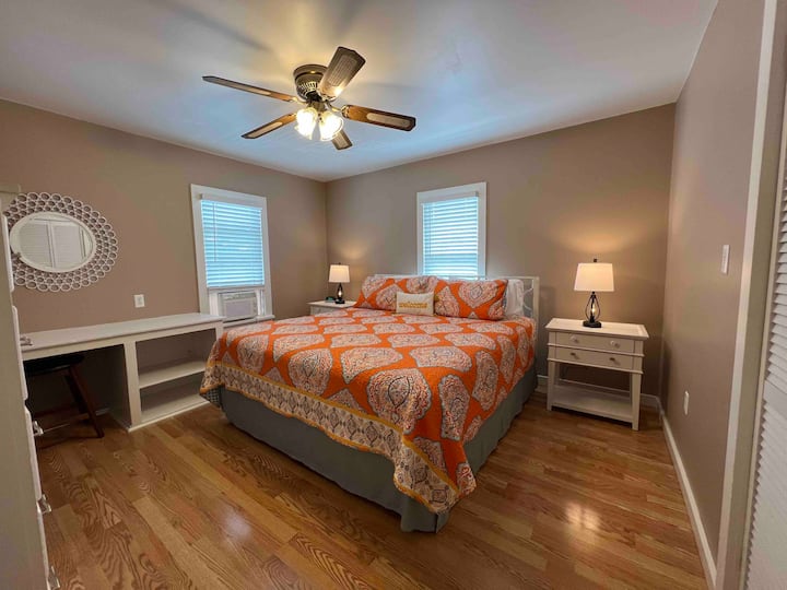 King size bedroom with new side tables and lamps with power charging!  