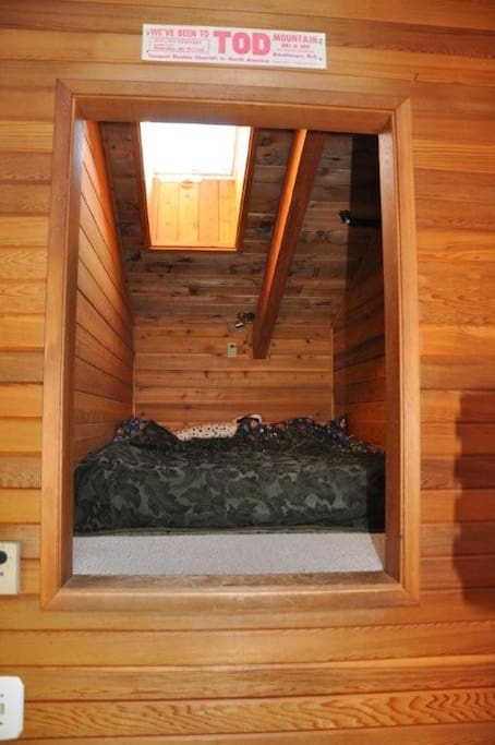 Comfortable double bed in the loft with Skylight opener