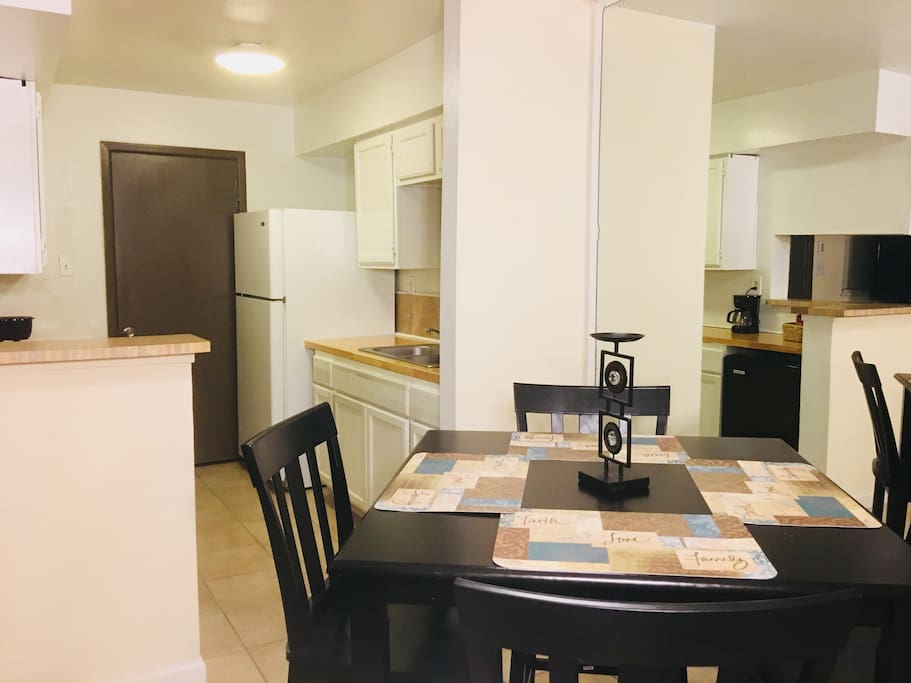 Adjacent to the dining area is the kitchen.