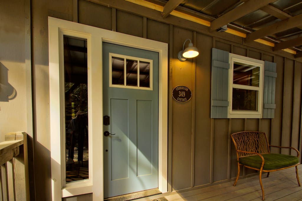 A well lite front porch is inviting you to step in and Welcome Home.