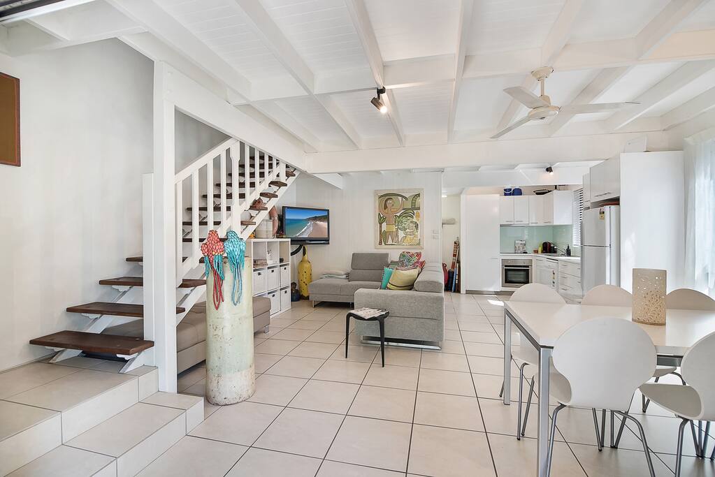 Bright Open Plan Kitchen and Living Opening up to Private Deck and Rear Garden