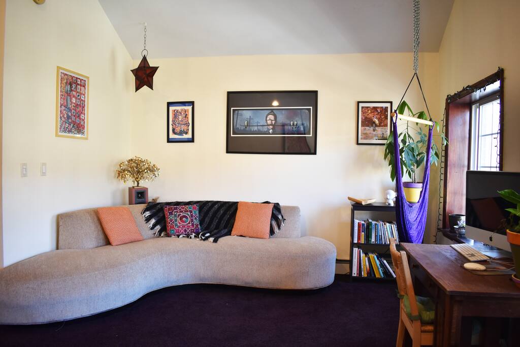 Spacious and bright Living Room. Comes with a very thick and plush eggplant-colored carpet to roll around on if you wish.