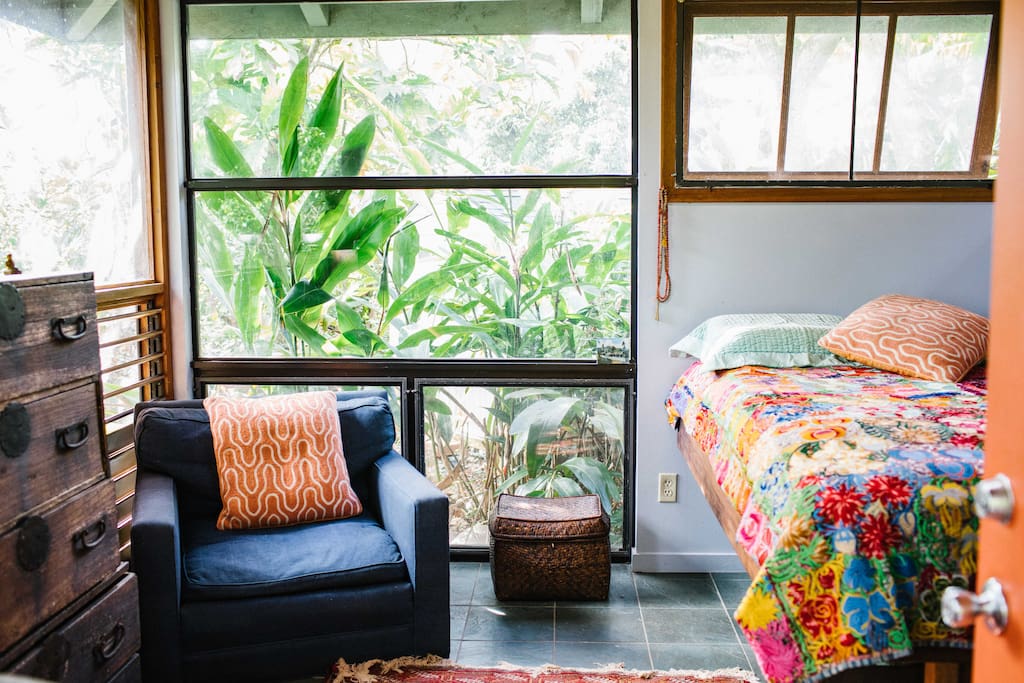 Surf Shack is surrounded with windows for great air flow and beautiful light overlooking tropical jungle