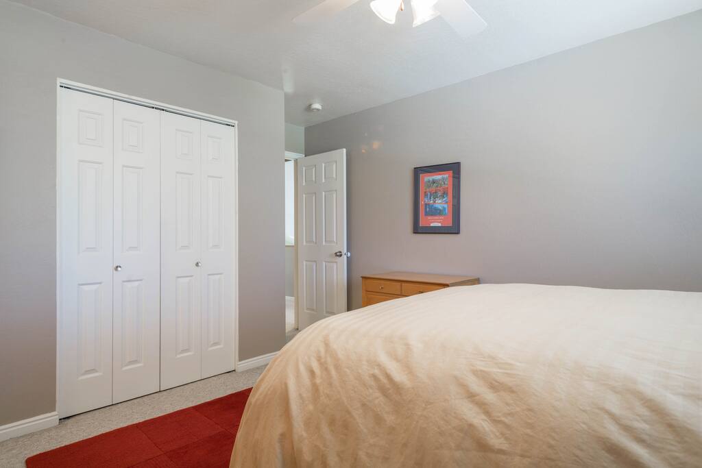 Door into the room off the stairs.