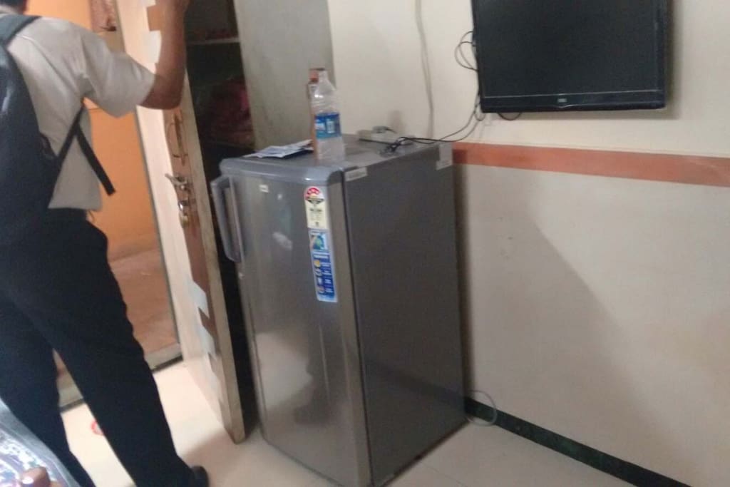 Wall Mounted LCD TV & Fridge