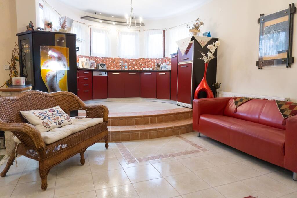 The kitchen & the second living room with the fireplace