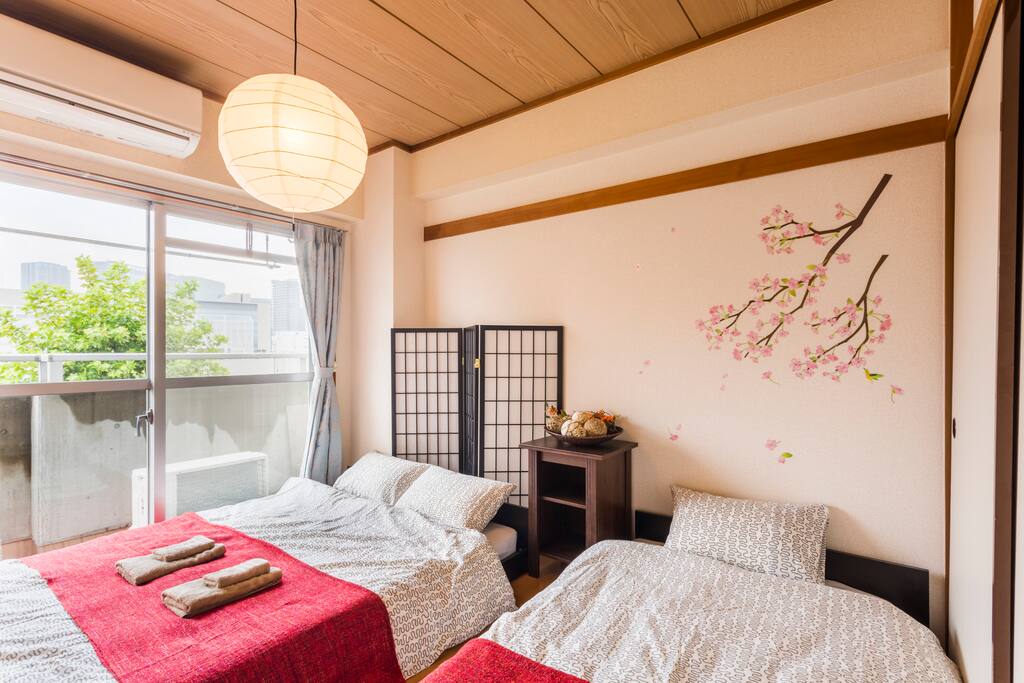Bedroom 2. There are one doulbe bed and one single bed. Two can sleep on the doulbe bed and one can sleep on the single bed.