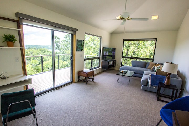 Upstairs living area has plenty of windows and access to the upper deck