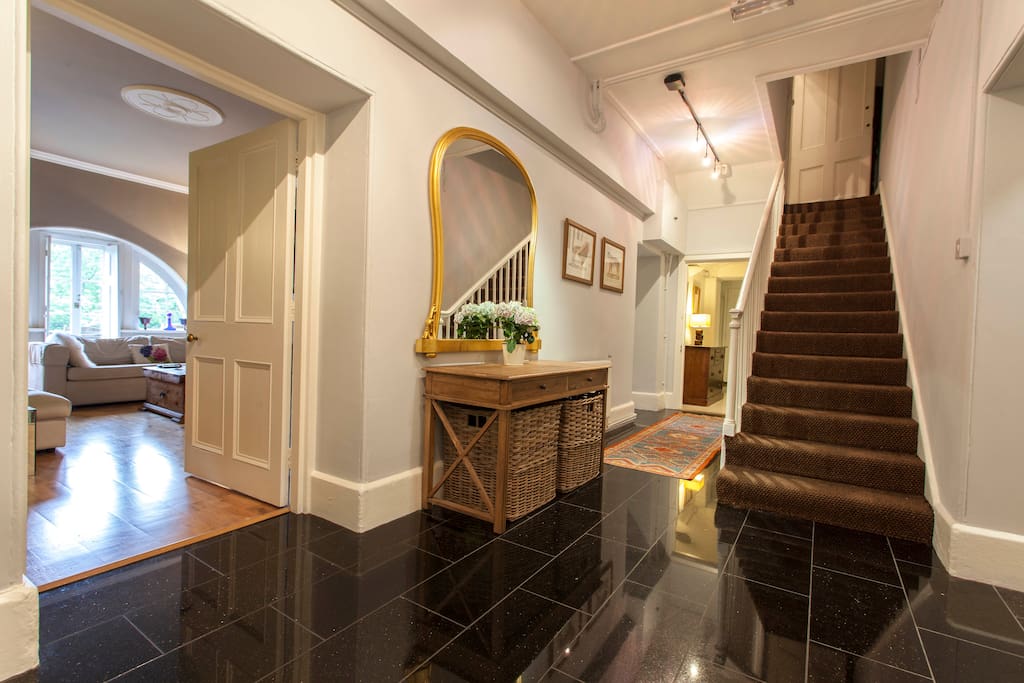 Main hallway
with sitting room off to the left and stair to main house - door locked at top