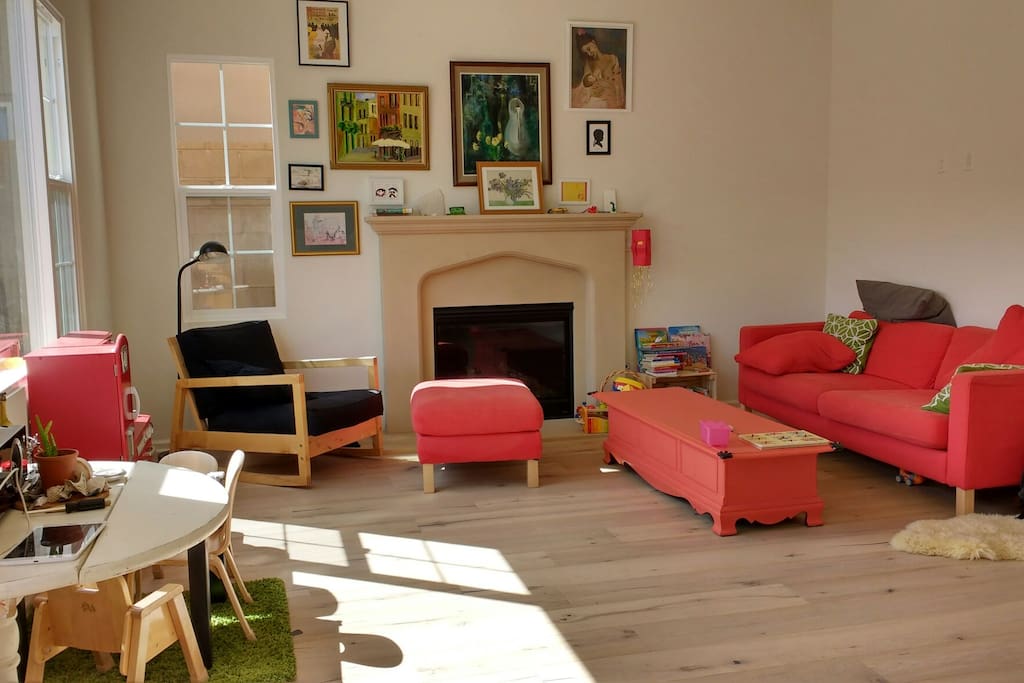 livigroom.with cosy fireplace and lots of sunlight