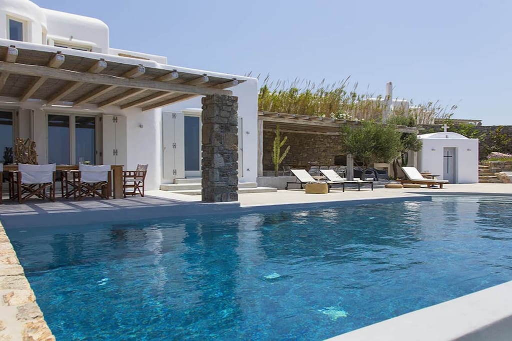 Swimming pool, lounge area & private chapel