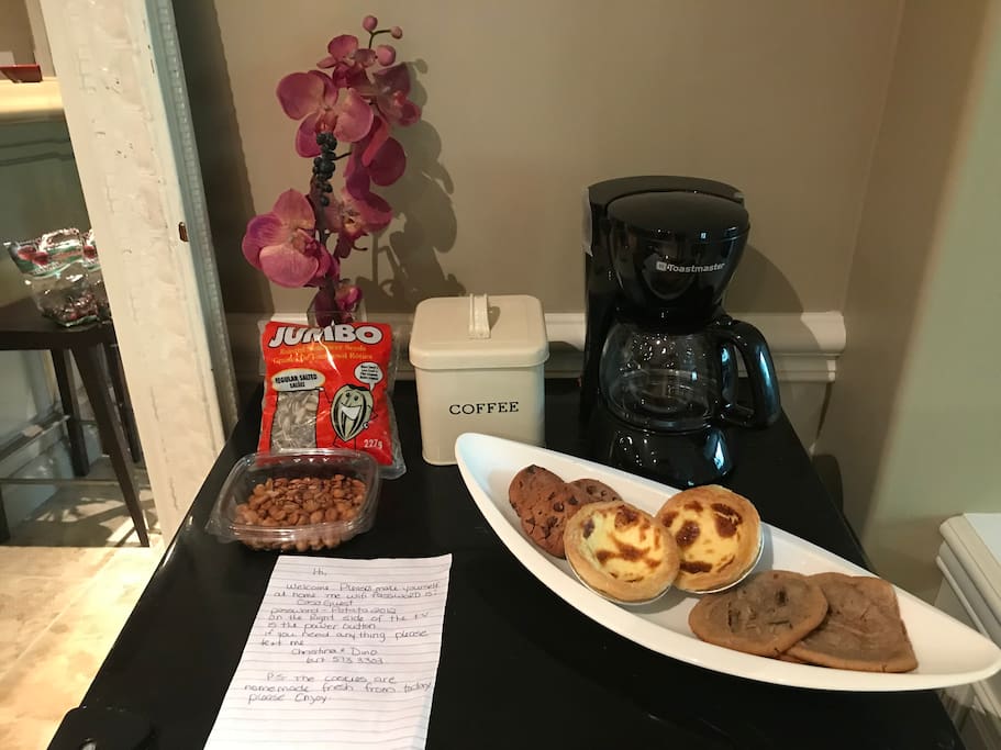 Beverage station : coffee maker , second fridge.