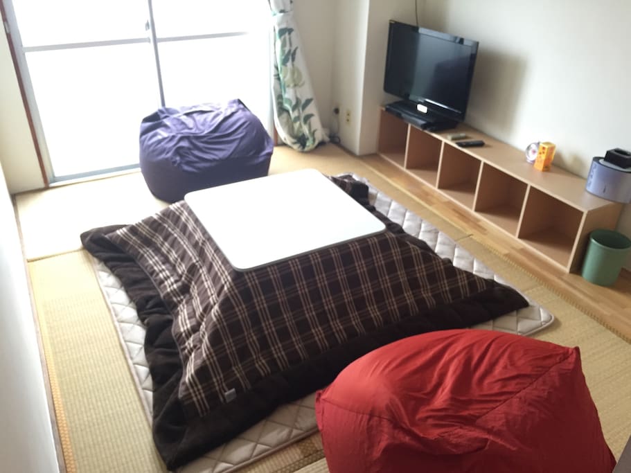 A kotatsu is a traditional heating system in Japan, which is a table and a heater combined as one piece of furniture.