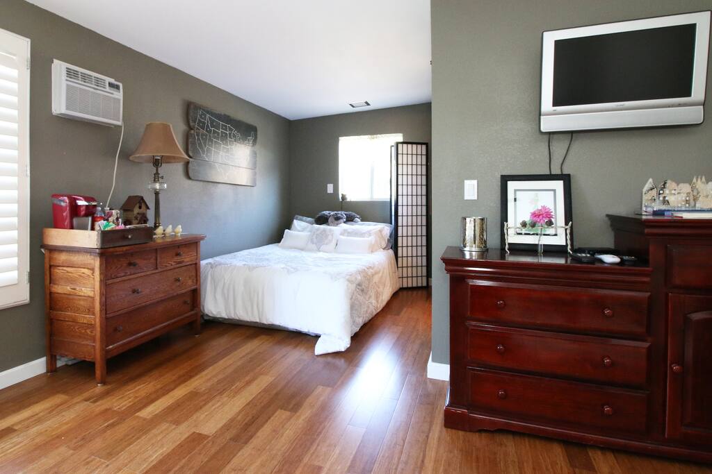 The second bed. The divider can be used for privacy between the two beds. Your beverage center is conveniently located in the room!