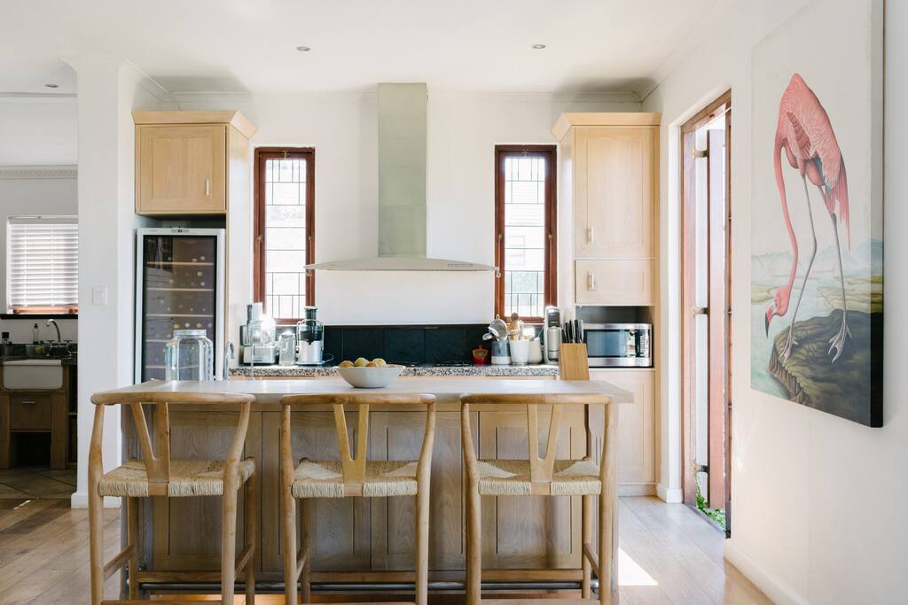 Open plan kitchen leading to scullery and laundry.
