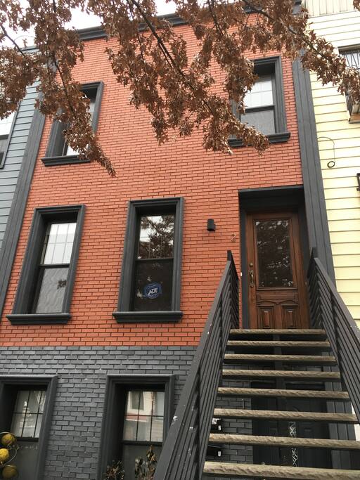 Front of house - unit is top two floors