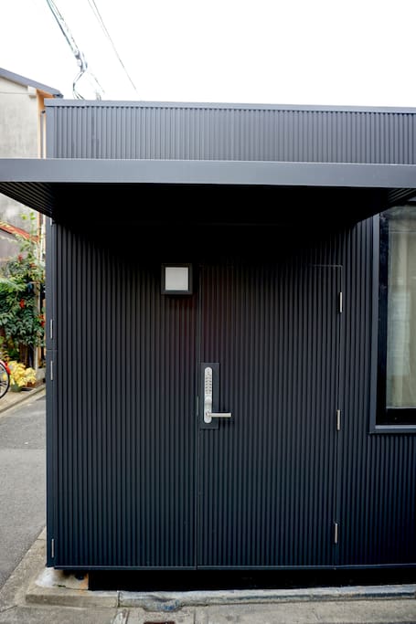 Simple, elegant proportions and lines create the entrance to the house.