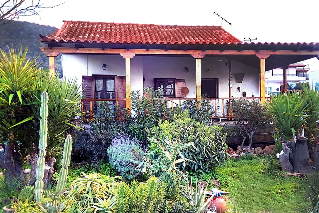 Xanthi's home; The detached maisonette with its garden