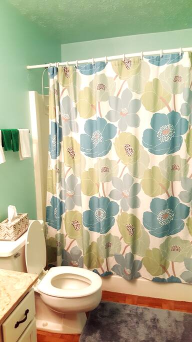 Clean and spacious private bathroom.