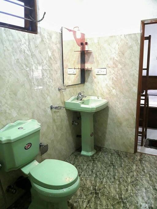 private bathroom with shower right bedroom