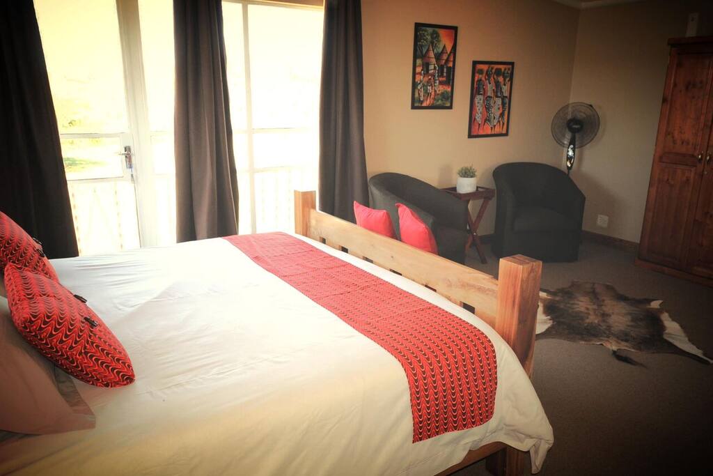 Bedroom with small lounge