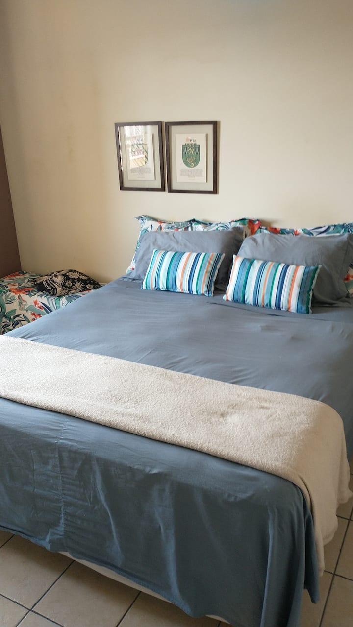 Suite with queen bed.
