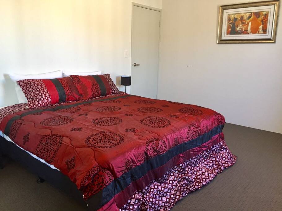 Master bedroom with king sized bed