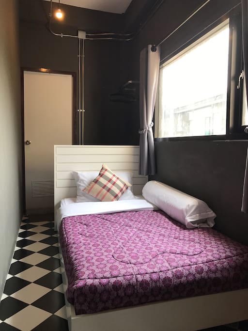 Comfy single bed with bathroom perfect for solo traveller.