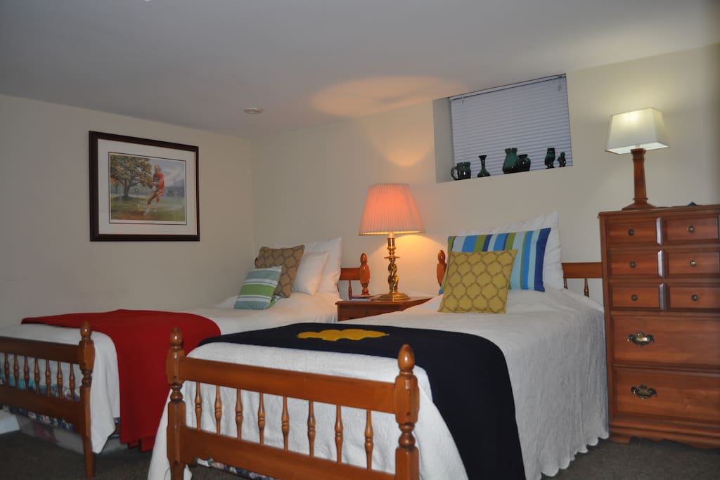 Spacious bedroom with two single beds, another view