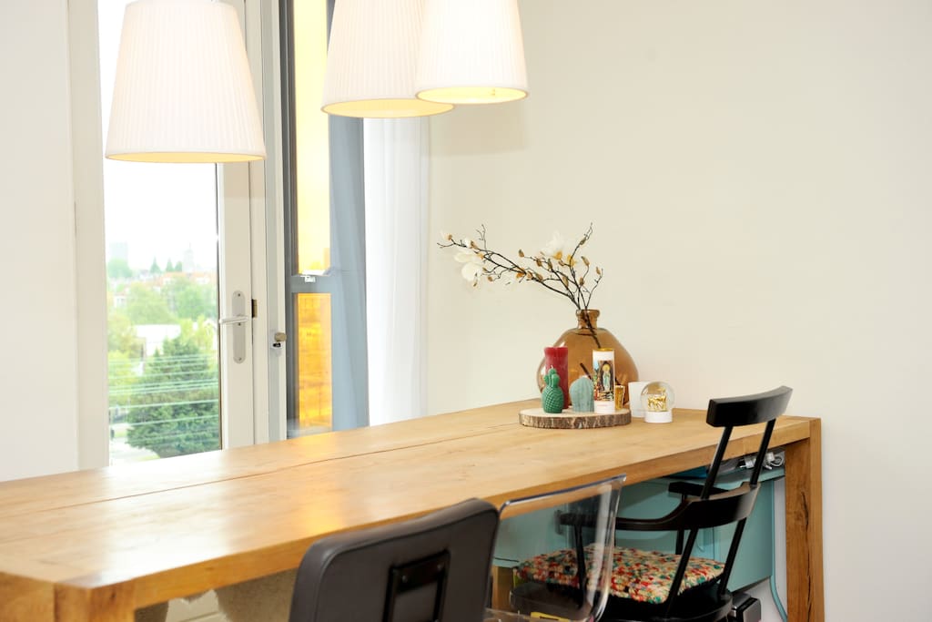 Bright dining room with table and a nice view