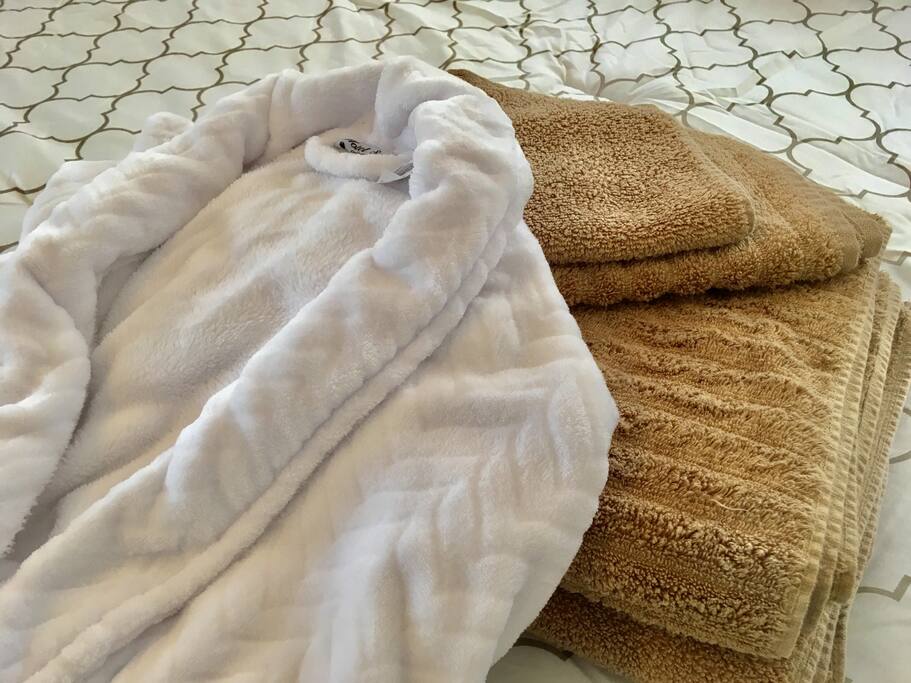 Hotel robes and fluffy towels.