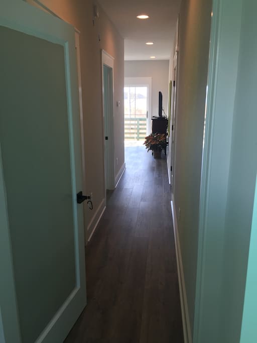 Hallway into the guest suite from the foyer when you walk in.