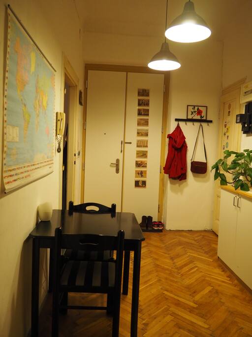Vestibule with world map and a second table