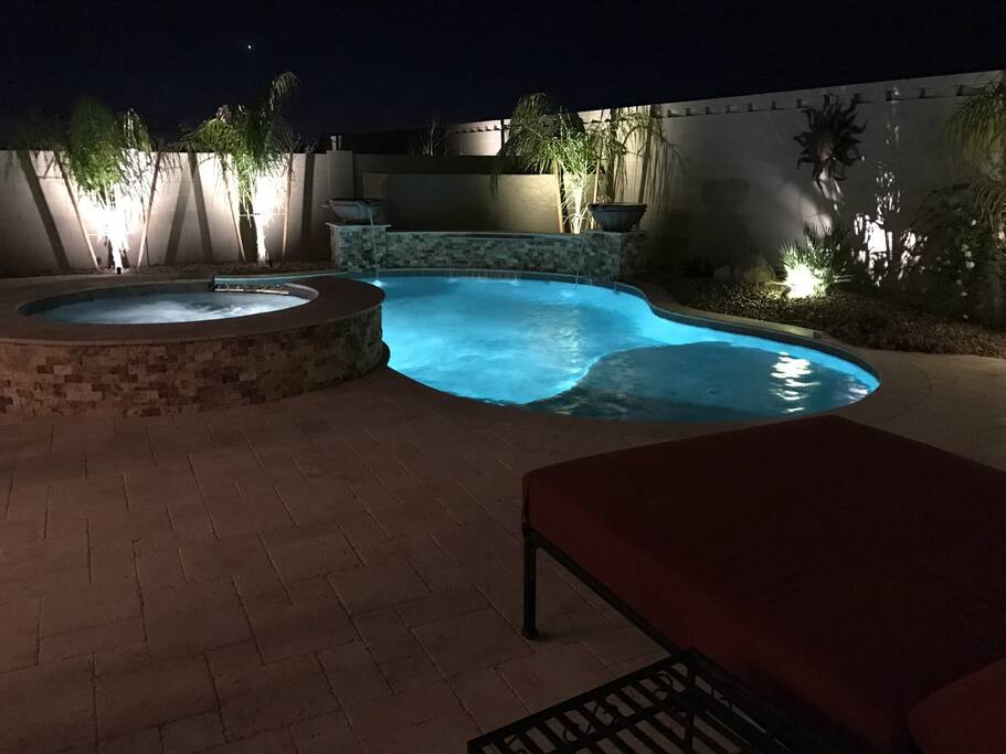 Custom pool and jacuzzi with water features