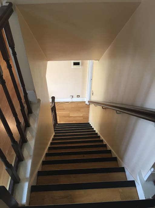 The stairs from living room to the bedroom