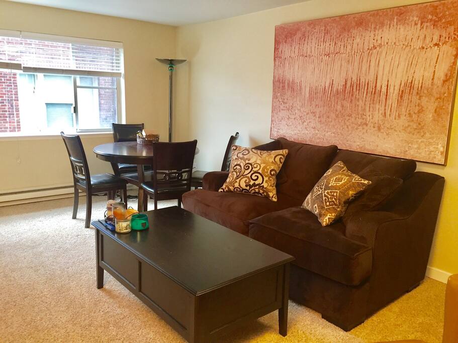 Spacious living room area with plenty of sunlight