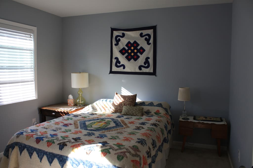 Queen bedroom in morning