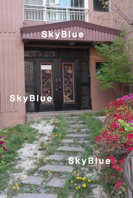 The main gate with stepping stones in May