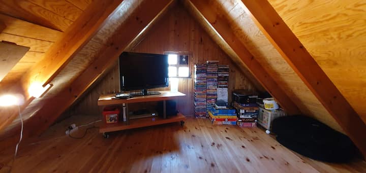 Upstairs is one single bed and one double bed, a tv, dvd with plenty of dvd's, a playstation, boardgames.and cartons to read.