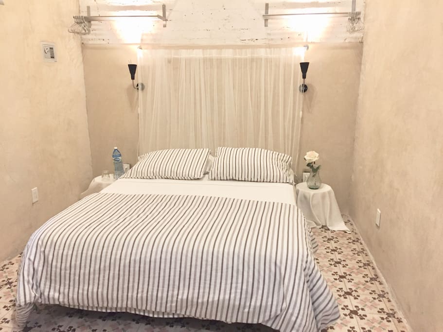 Room #4 has a queen size bed, private bathroom and it is quiet